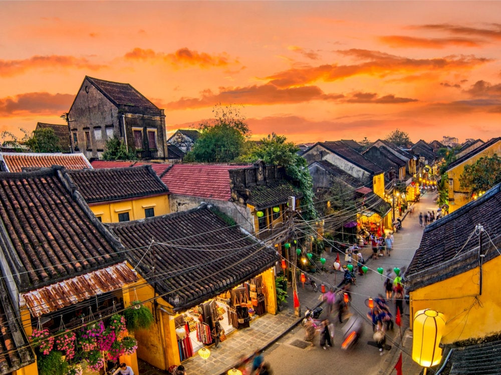 Explore centuries-old streets in Hoi An Ancient Town, perfect for leisurely walks and admiring historic architecture and vibrant street art